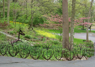 Flower Fence, a custom installation by Trellis Art Designs.