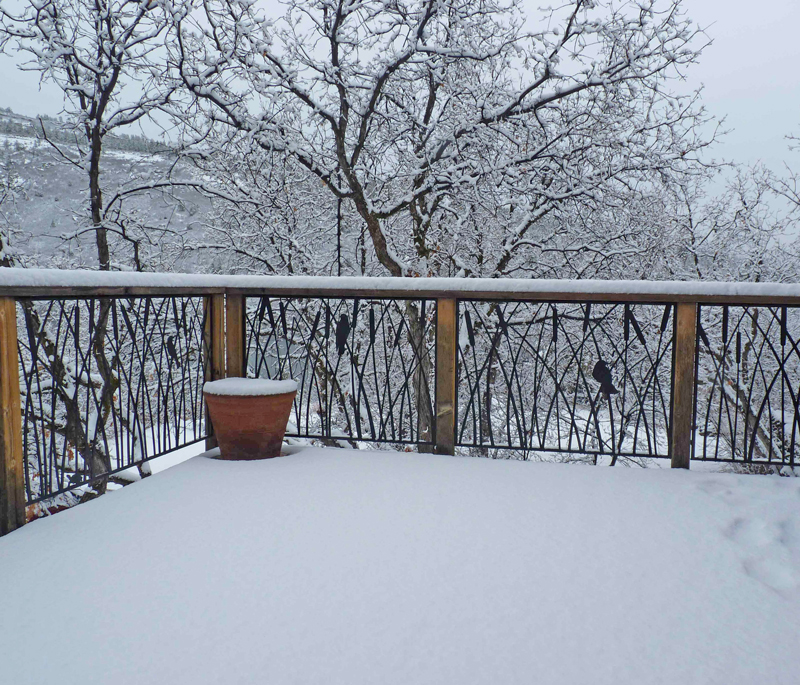 Cattails deck railing in snow by Trellis Art Designs